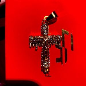 Gold and diamond Jesus pendant